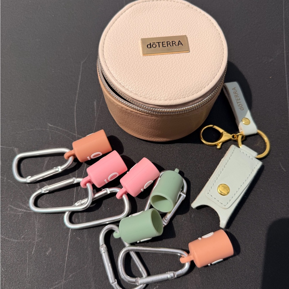 doTERRA oil case,6 roller silicone toppers,and a 15ml oil keychain holder
